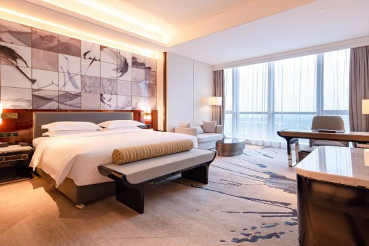 Отель Wyndham Grand Suzhou Fenhu Xinta Экстерьер фото