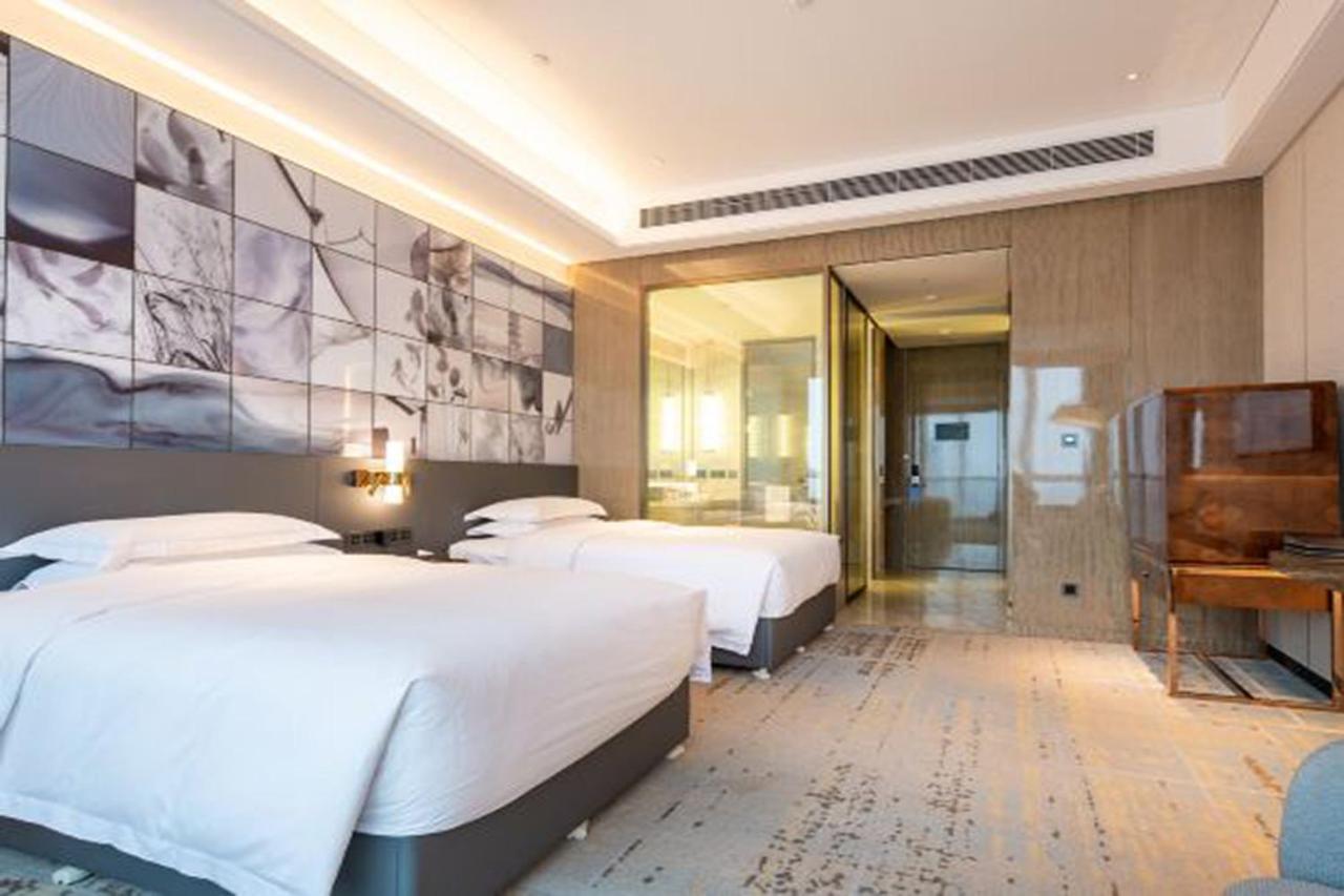 Отель Wyndham Grand Suzhou Fenhu Xinta Экстерьер фото